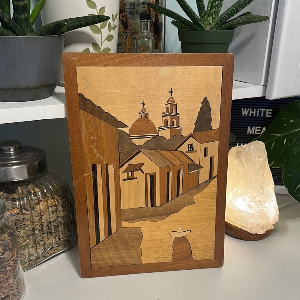 Beautiful vintage wooden inlay art depicting church scene.Features natural wood.
